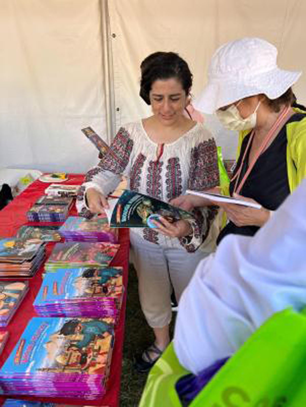 Maria at LA Festival of Books with attendee, photo by: Dieuwertje Kast, permission to be reproduced