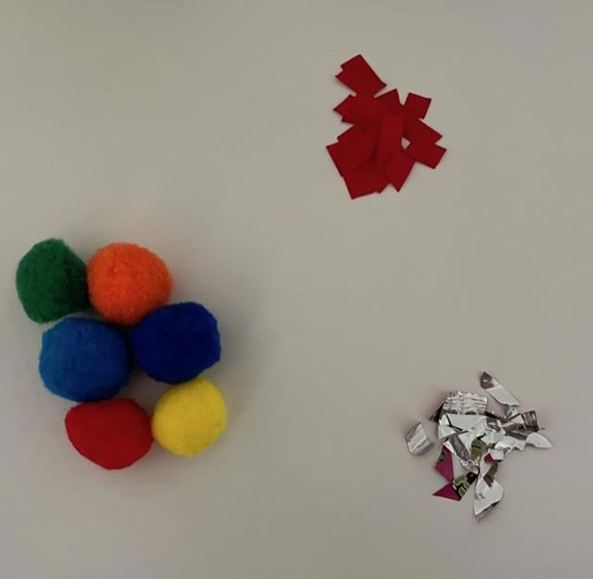 Examples of microplastic pieces used in “MicroGlobe” such as ribbon