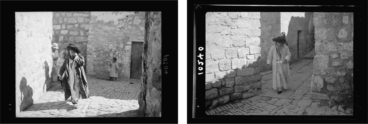 Images of Jews in Orthodox dress walking through the streets of Jerusalem