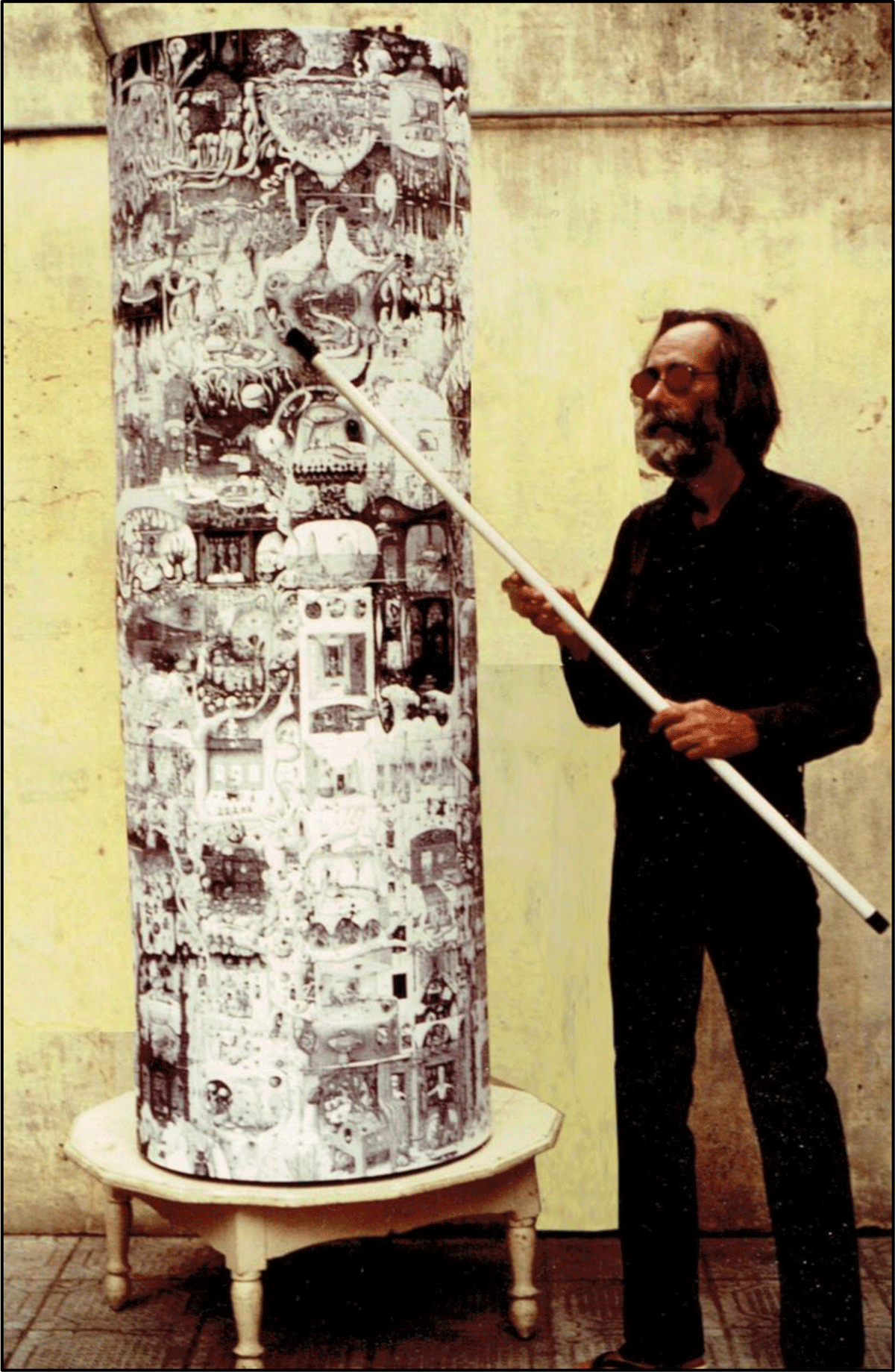 Deluz posing as a bard next to the cylinder. Picture taken by Christophe Deluz around 1988. JJD archive fonds. Algiers Diocesan Study Centre. Unclassified