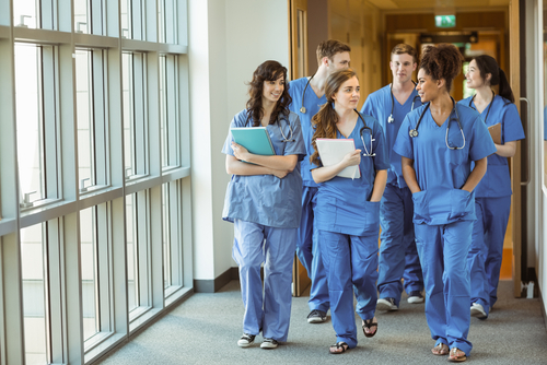 Medical students in hallway.