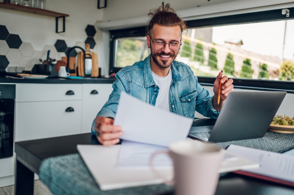 Accountant working from the kitchen.