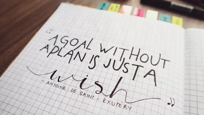 journaling on block paper with colourful page dividers