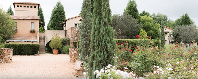 avianto wedding venue outdoors with gravel walkway and green trees