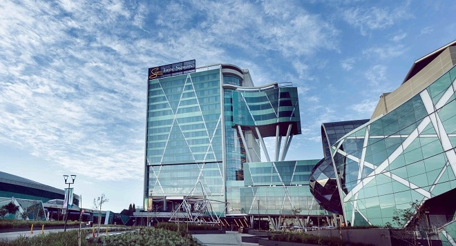skyline view of time square south africa in pretoria during the day with clear blue skies in the background