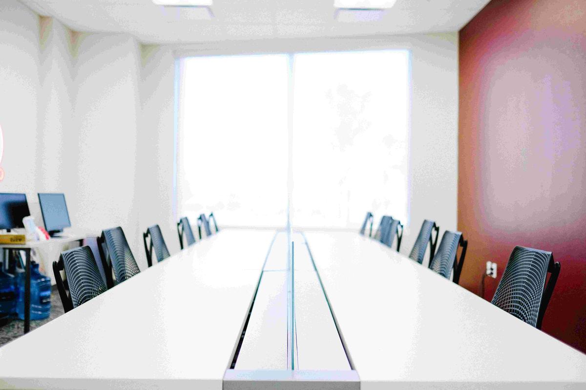 Empty desks in an office meeting room