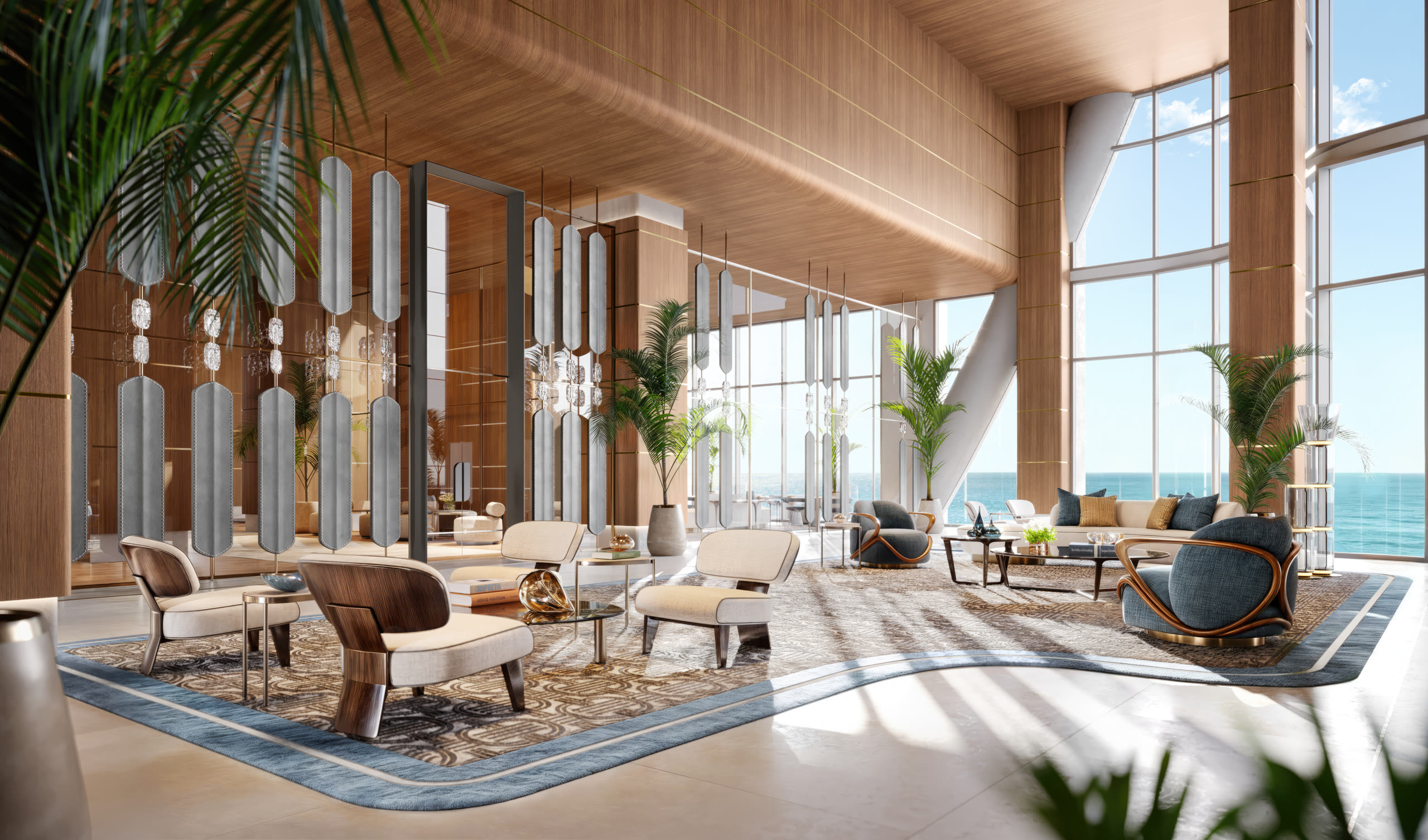 Double-height North Tower lobby with grand staircase and oceanfront outlook