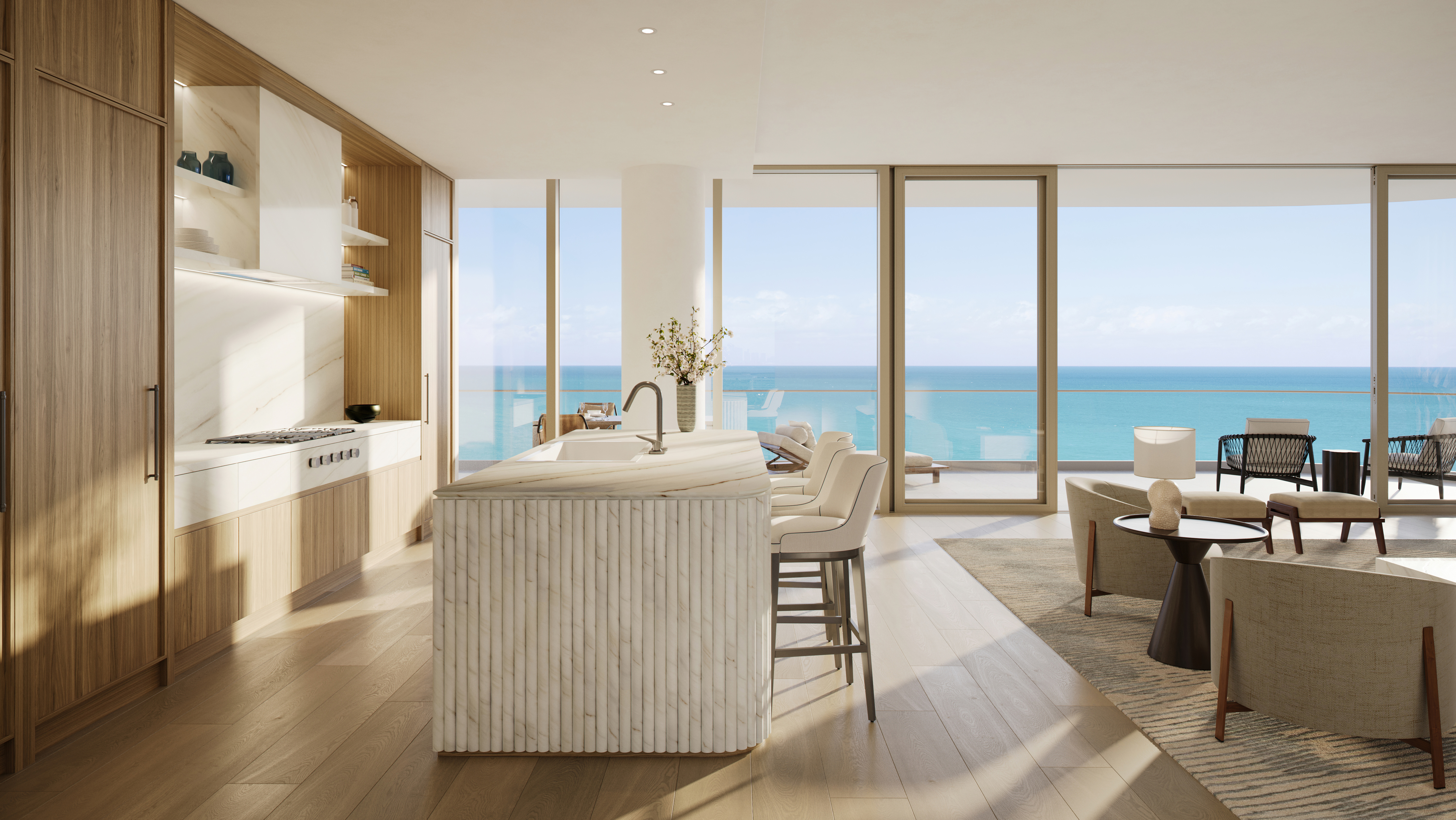 A residence kitchen with custom Italian cabinetry, honed marble island, and floor-to-ceiling windows to the Atlantic