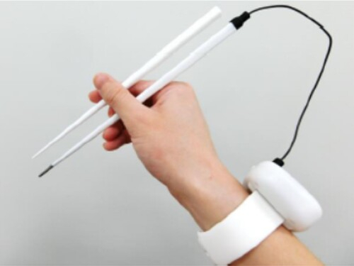 A pair of electric chopsticks.&nbsp; &nbsp; &nbsp; Source: Kirin Holdings