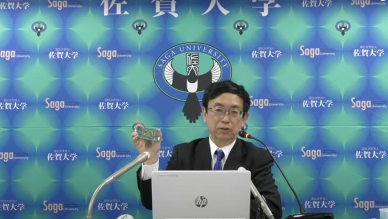 Makoto Kasu of Saga University holding the world’s first power circuit using diamond semiconductors.&nbsp; &nbsp; &nbsp;Source: Saga University