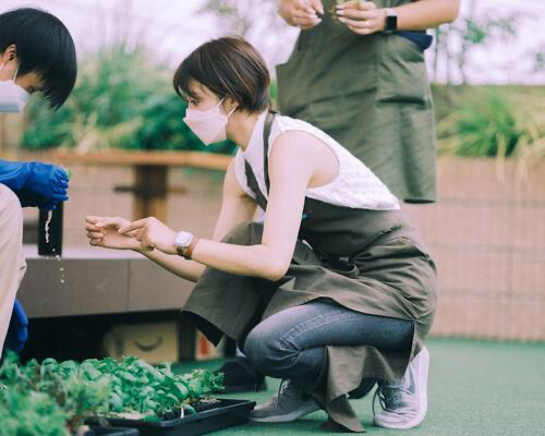 Ryoko Kobayashi works alongside farm staff who have disabilities.&nbsp; &nbsp; &nbsp;Source: Agriko