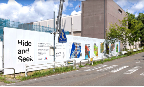 A construction site wall is decorated with artworks by Heralbony artists. &nbsp; &nbsp; Courtesy of Heralbony