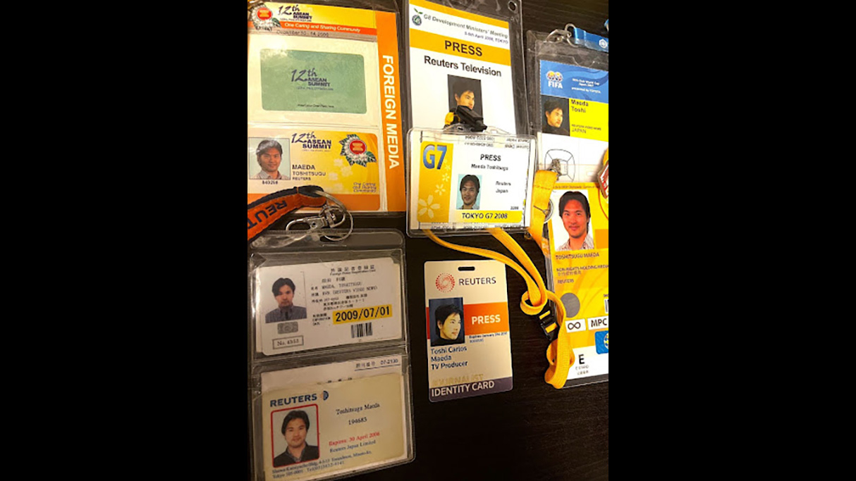 Press credentials and interview passes from the Reuters days.