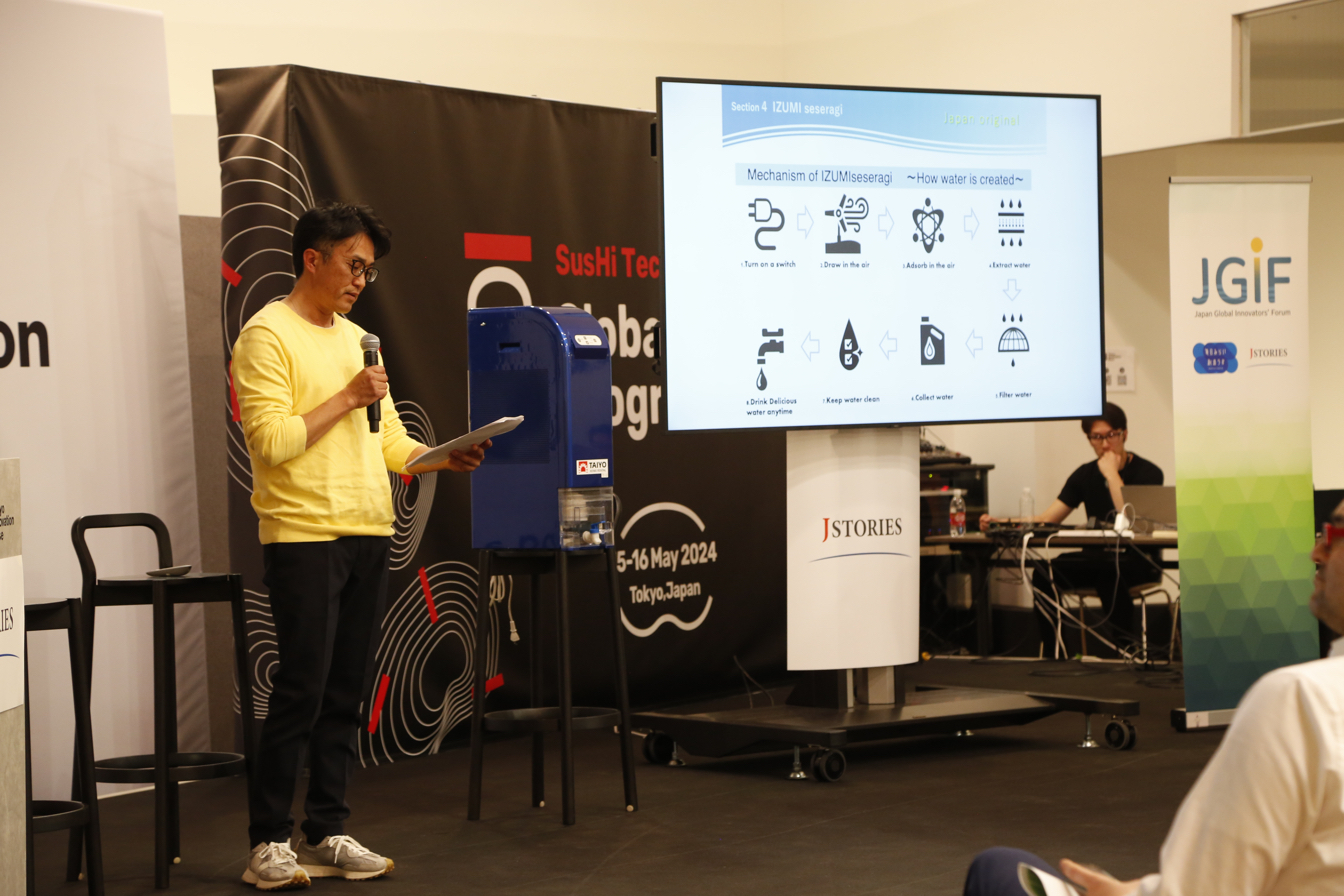 Motoki Hachisuka from Ai Heart Japan demonstrates the company's atmospheric water generation (AGW) technology that can turn the air into drinking water.&nbsp; &nbsp; &nbsp;