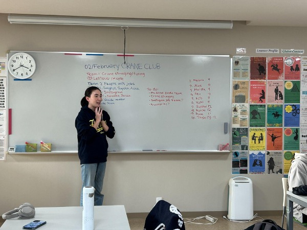 Alina Shige-Hird at weekly activity of Crane Club, summarizing what needs to be done and assigning students for each task.&nbsp; &nbsp; Source: The Thousand Crane Club