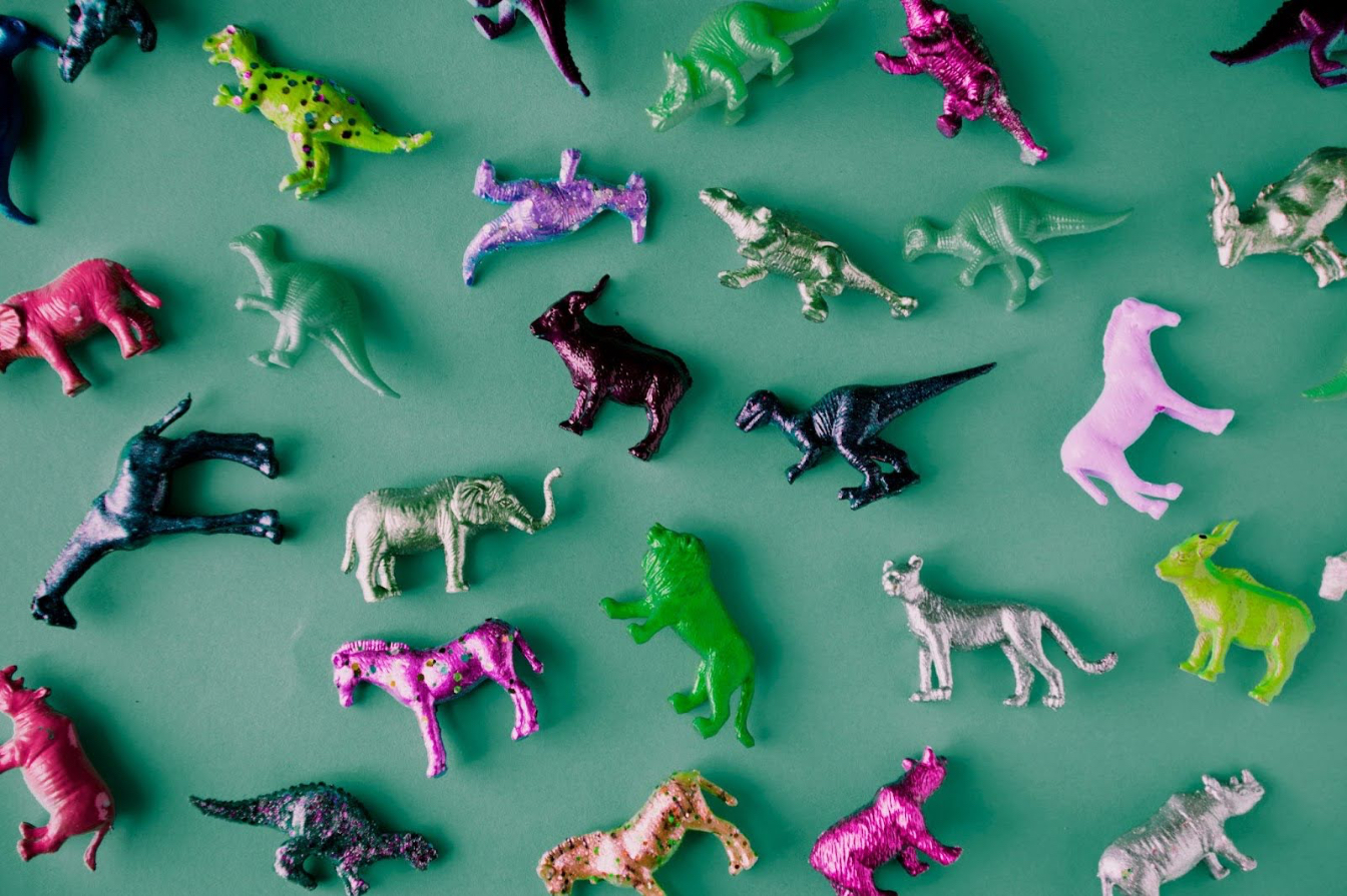 An illustration of a colorful array of agents — each unique in form and function — reflecting the idea that survival favors freedom, diversity, and agency. Photo by Envato