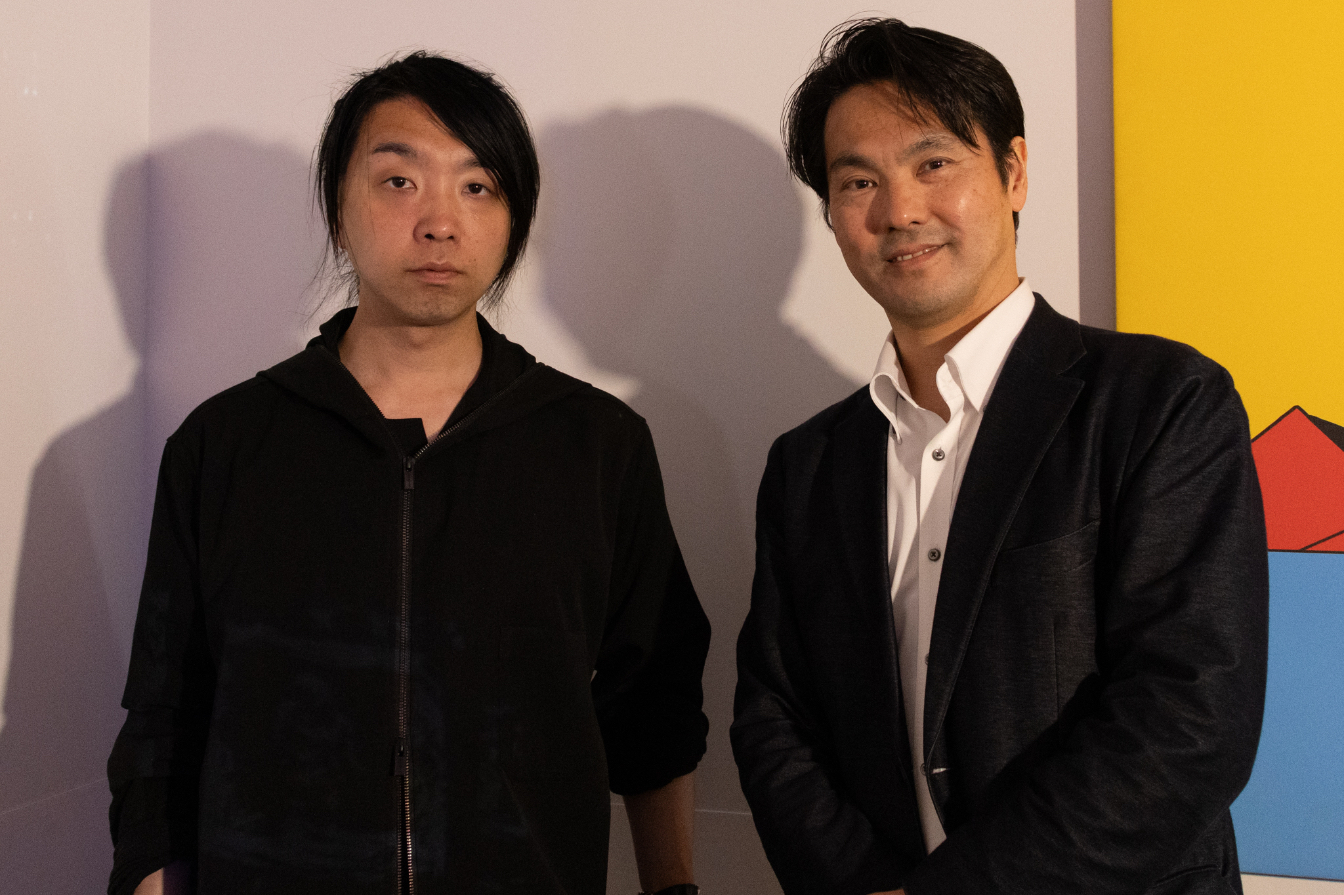 Yoichi Ochiai (left) poses with interviewer Toshi Maeda, executive editor of JStories 