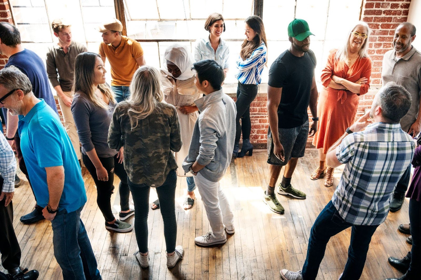 A collaborative discussion in action, where meaningful conversations foster trust and innovation—essential elements for building successful entrepreneurial ecosystem Source: Envato