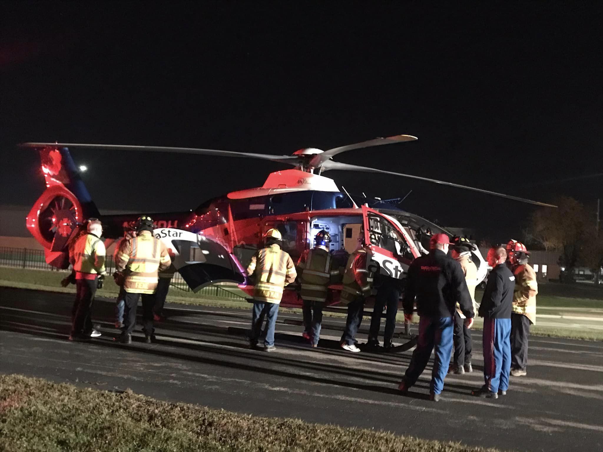 Emergency responders gathered at landing site