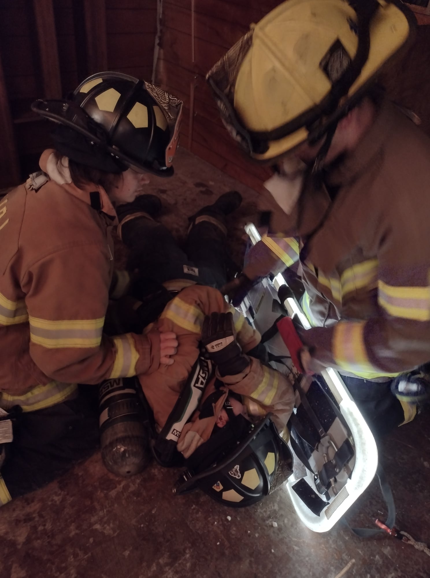 Rescue drill with firefighter mannequin