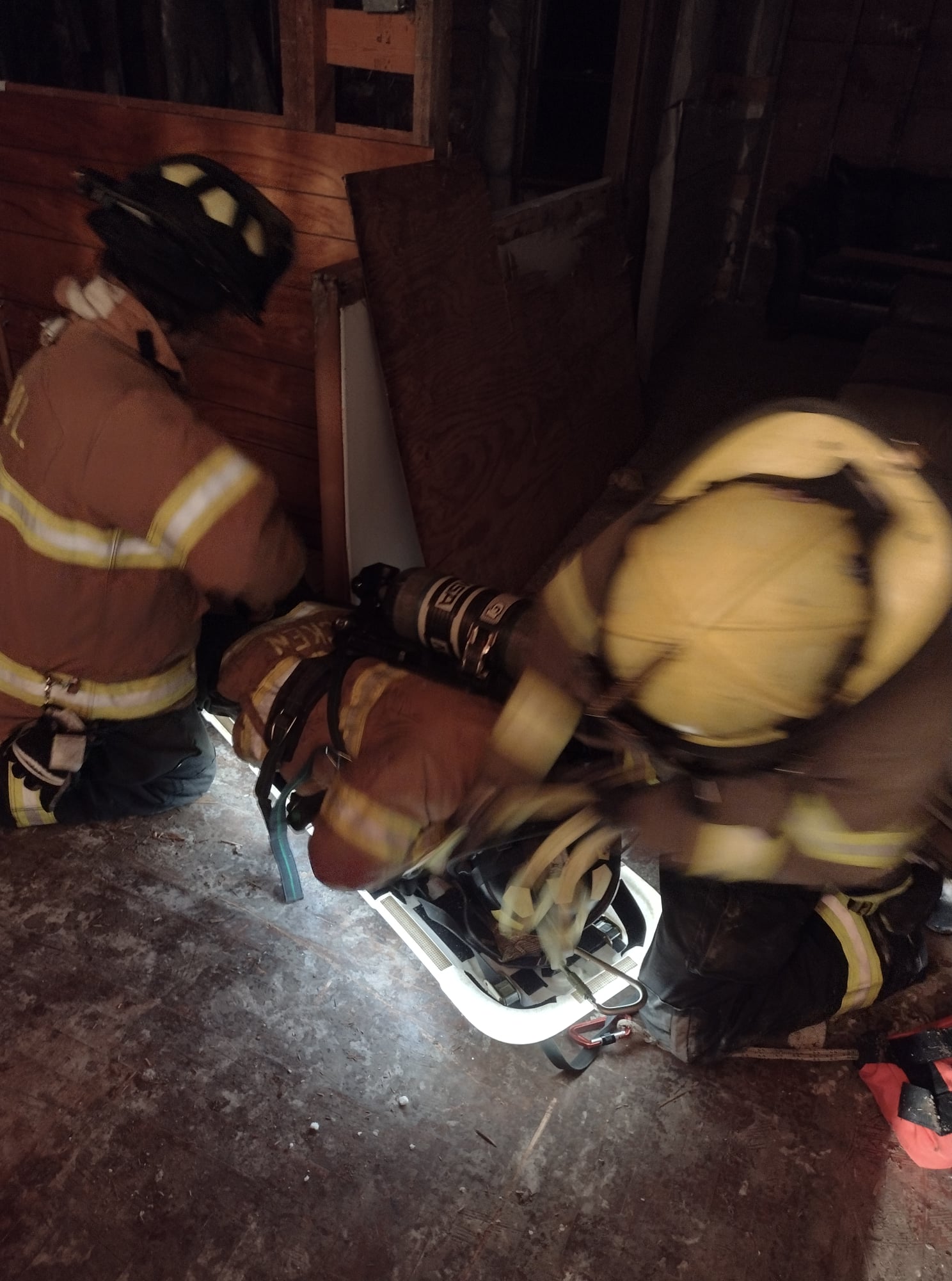 Team performing downed firefighter rescue