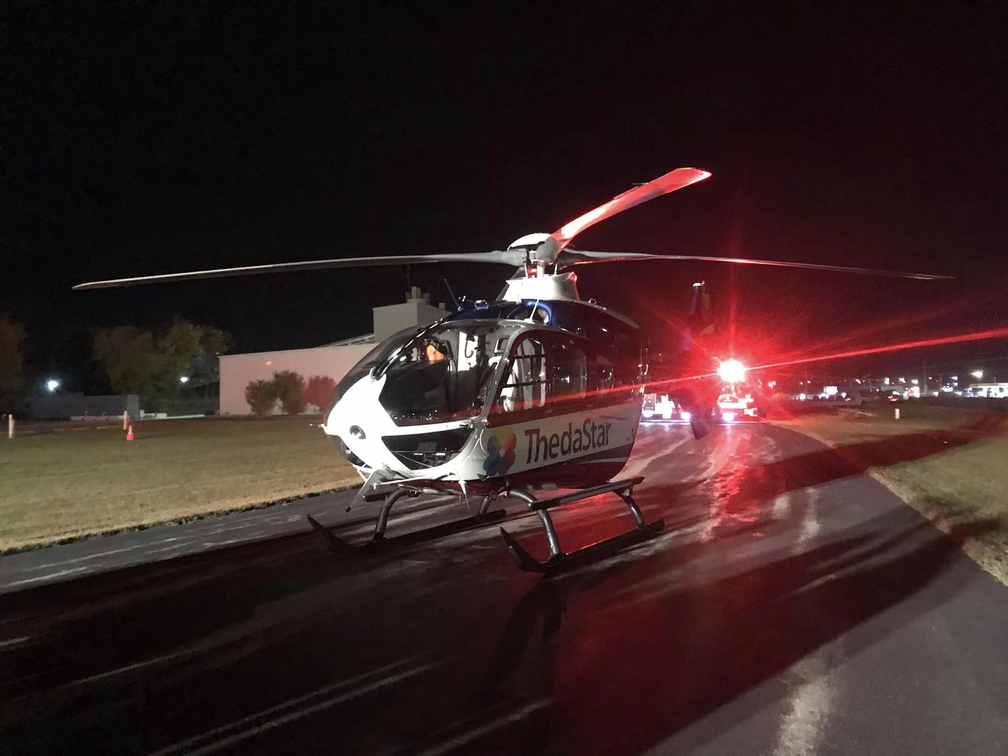 Medical helicopter arriving at night
