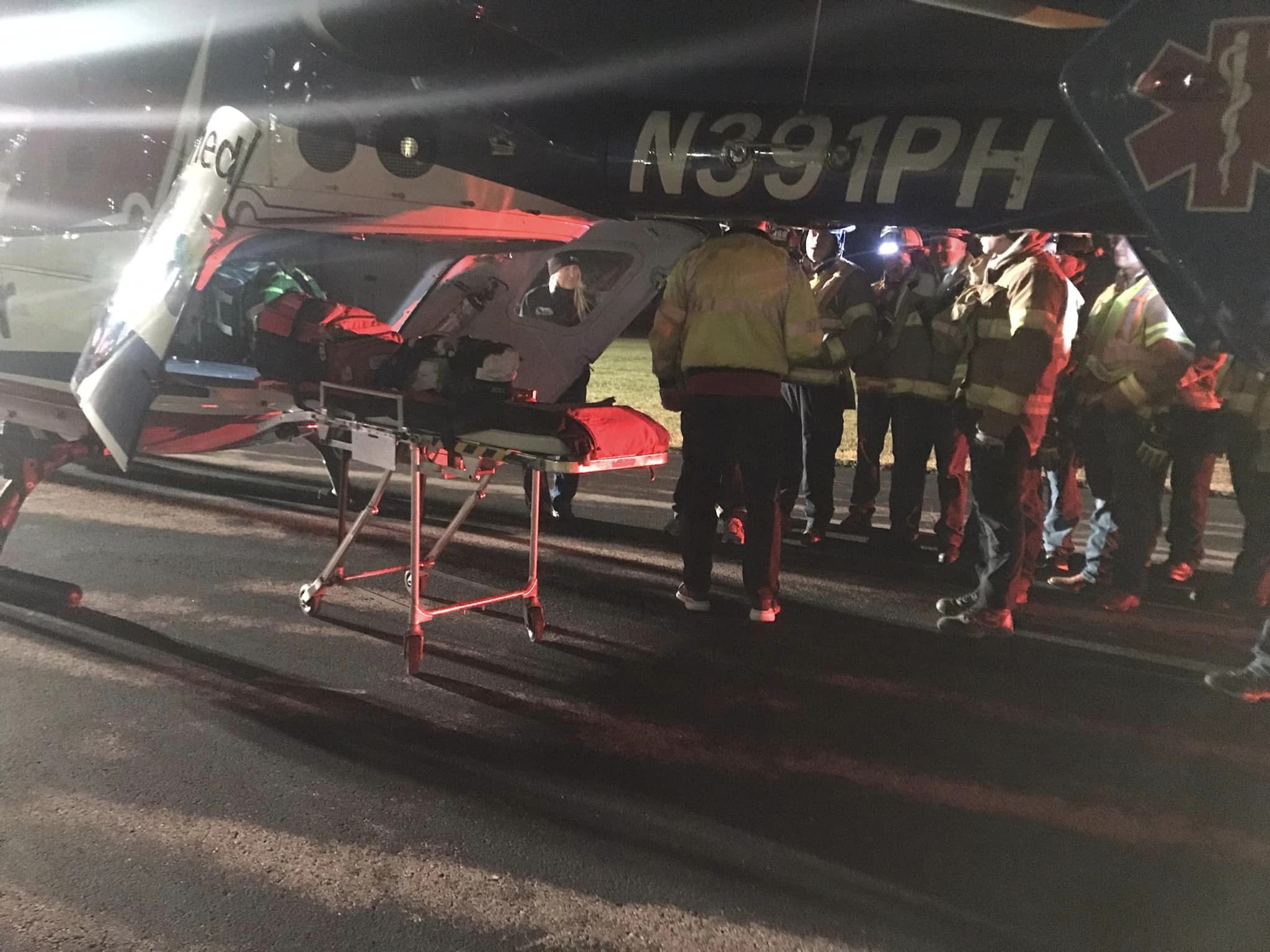 Patient being loaded into helicopter