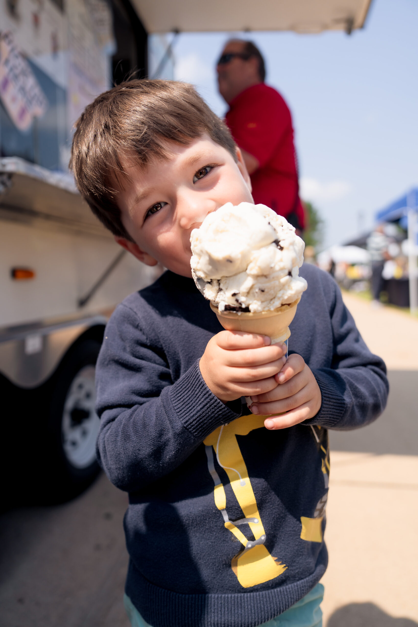 Young boy eating icecream