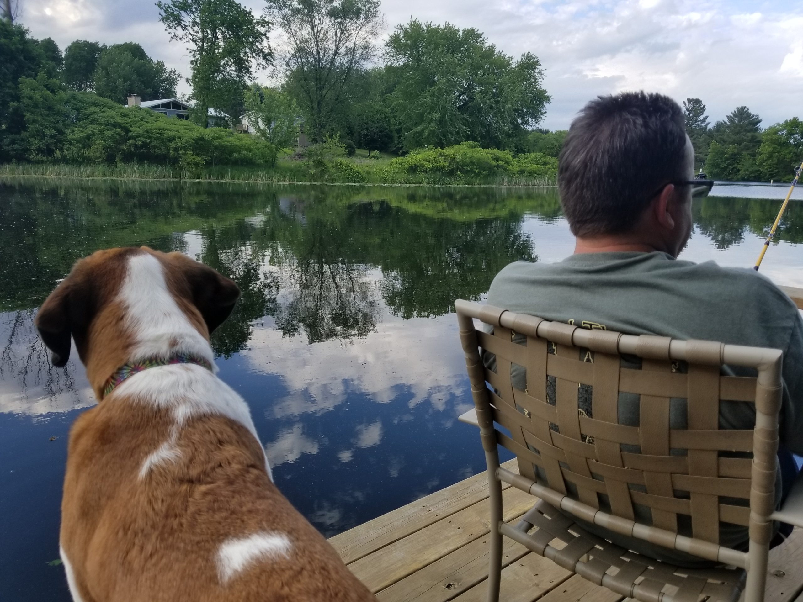 Man and dog boating