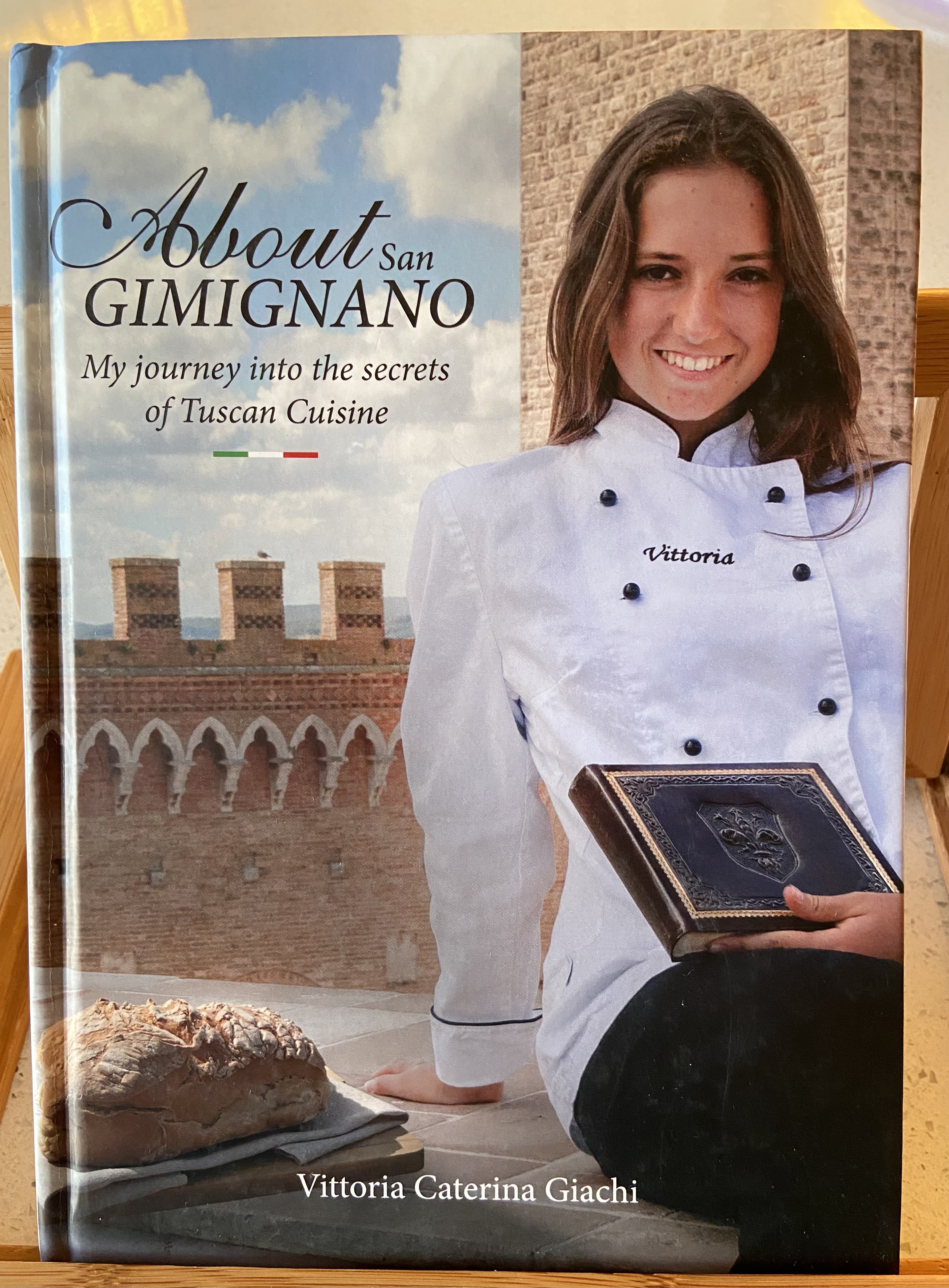 About San Gimignano: My journey into the secrets of Tuscan Cuisine (Signed by the Author)