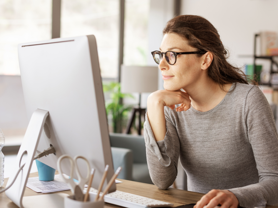 woman on laptop reading about R&D tax credits