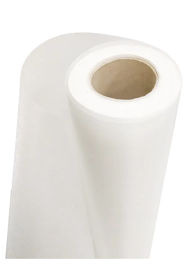 Toilet paper roll on marble stand.