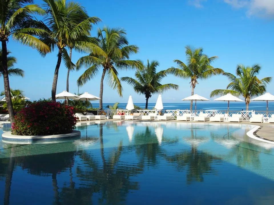 Mauritius beach side resort pool — destination photography from Mauritius