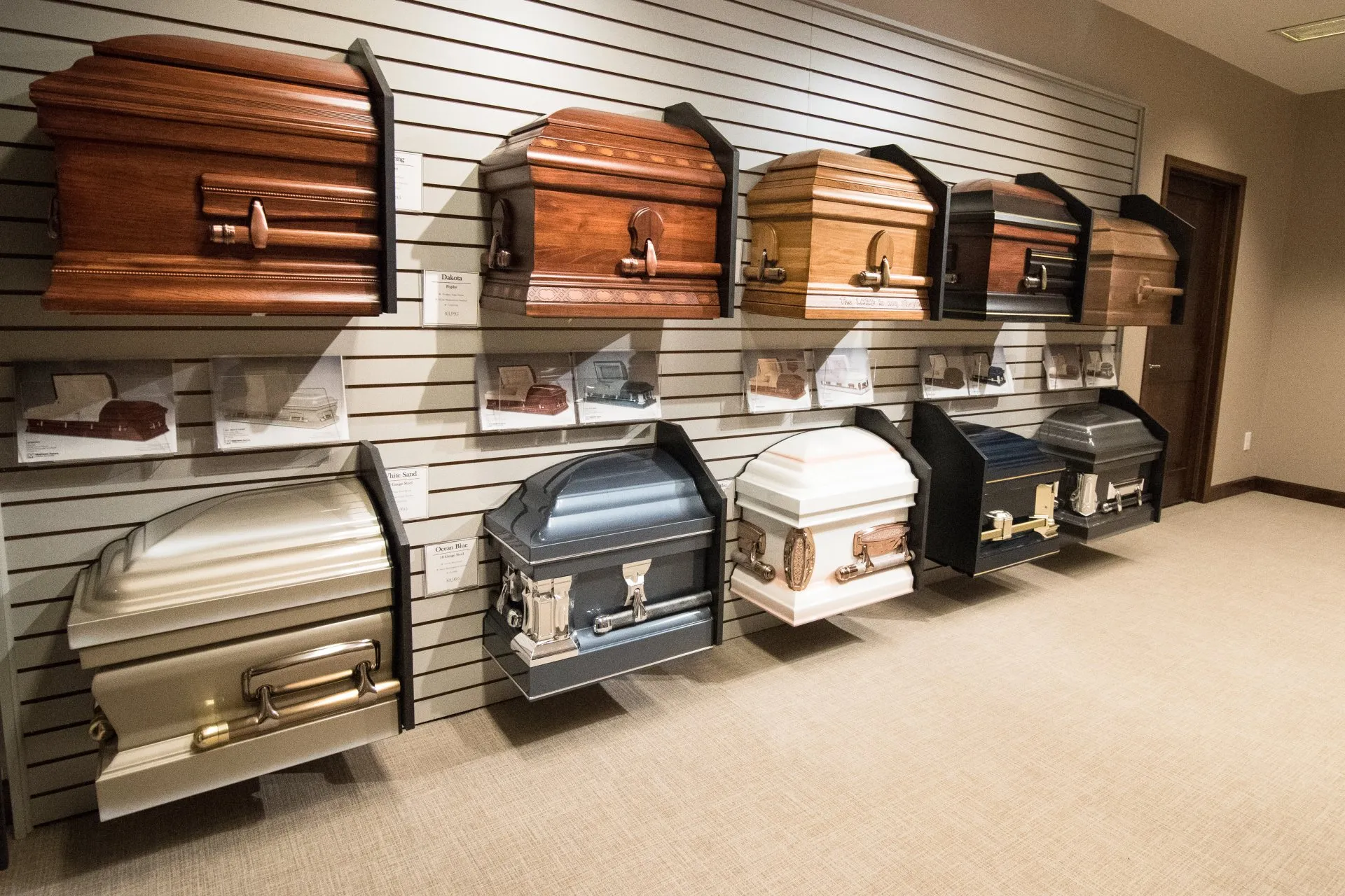 Casket display — wall of caskets