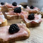 Honey Goat Cheese, Blackberry, and Prosciutto Crostini – Kitchen with Class