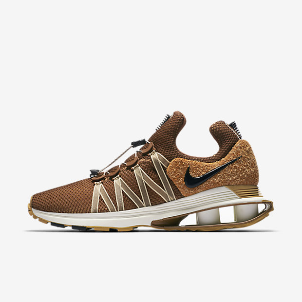 nike shox gravity elemental gold