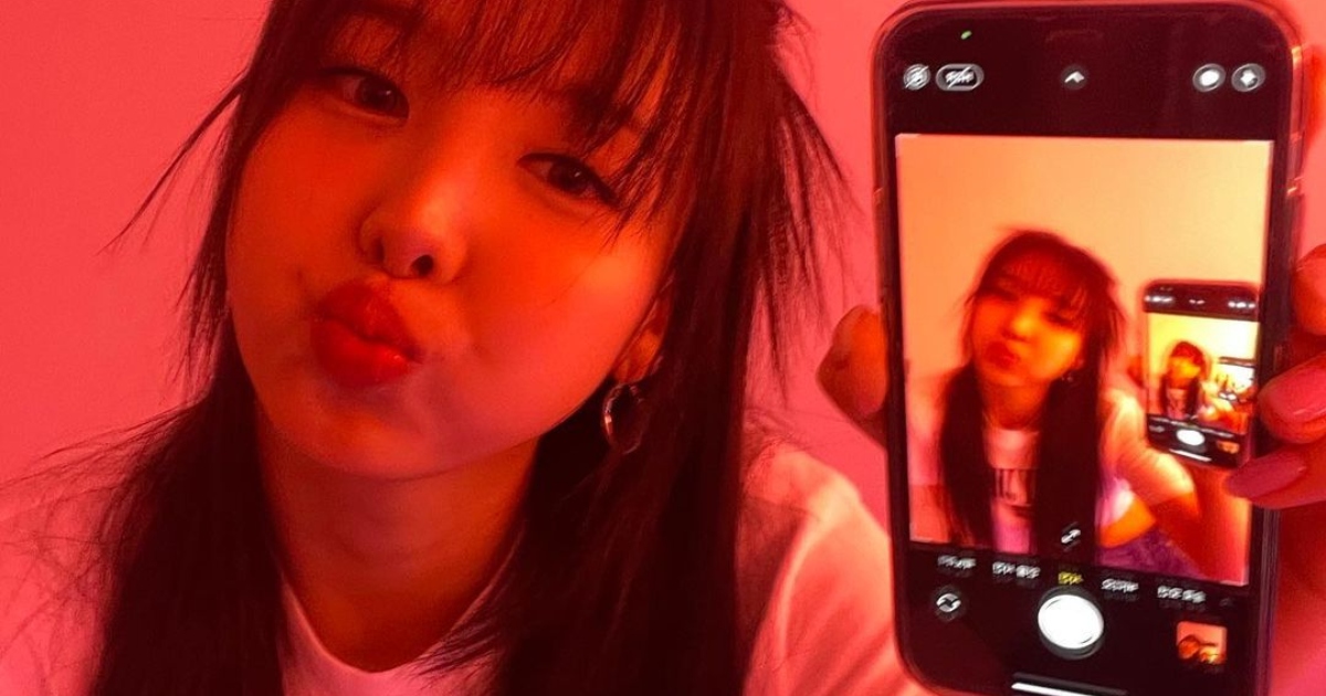 Free Photo Prompt | Smiling Korean Woman Takes Closeup Selfie on Boat