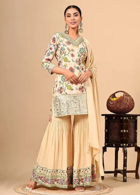Golden cream sharara set with gotta thread and sequins work