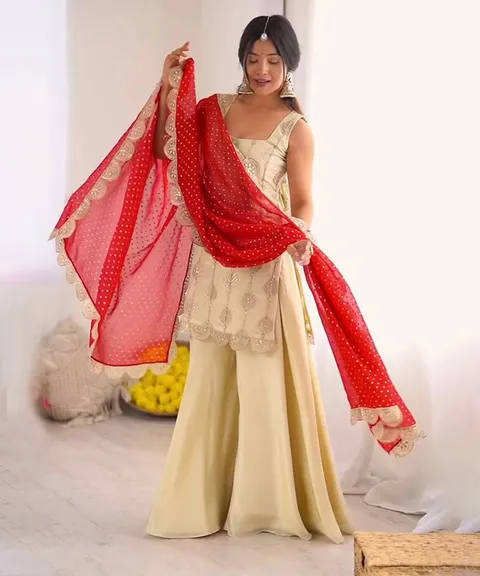 Off-white embroidered palazzo set with red dupatta