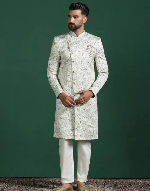 Cream sherwani pyjama set with paisley design