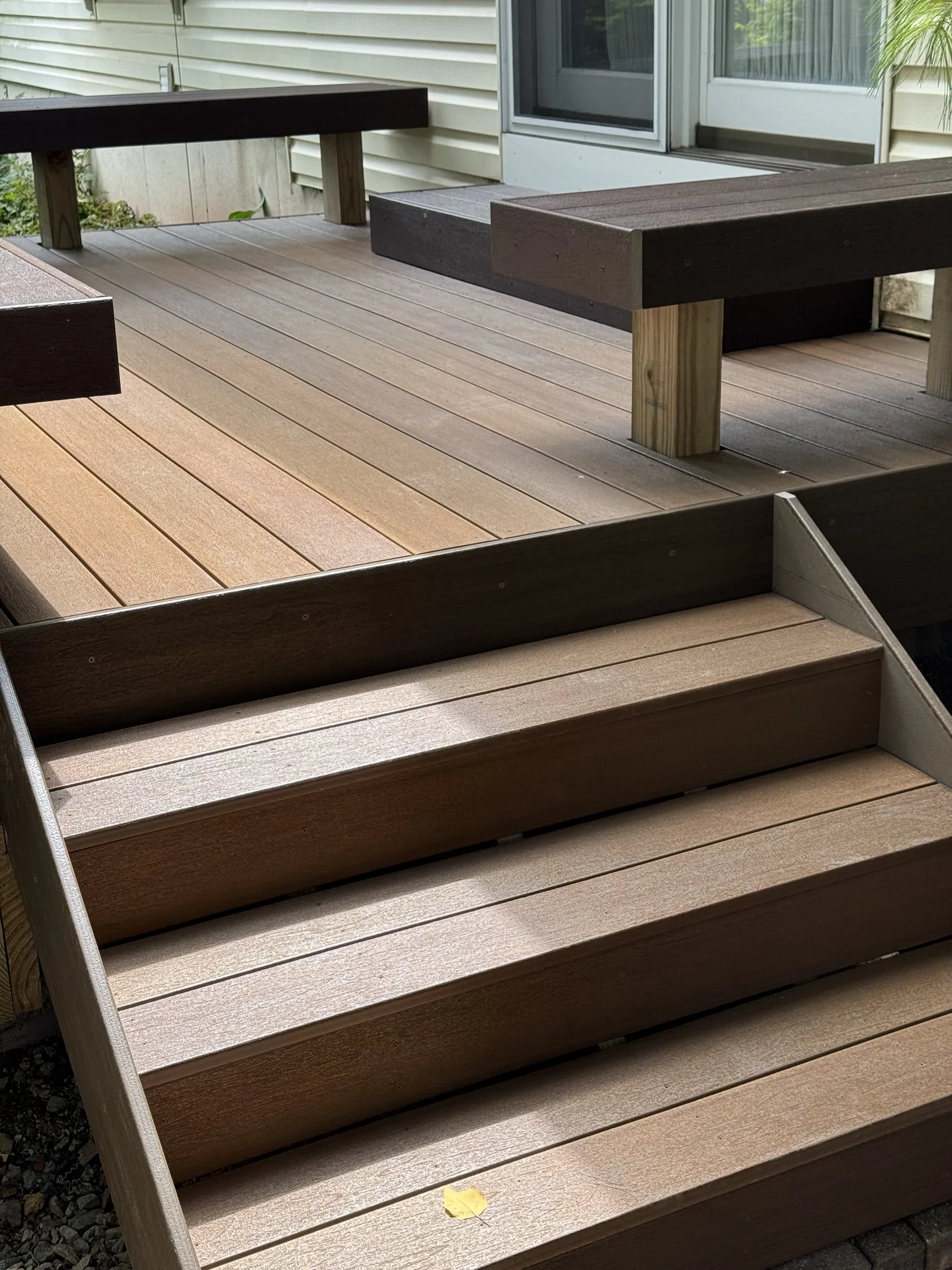 Composite deck with built-in benches