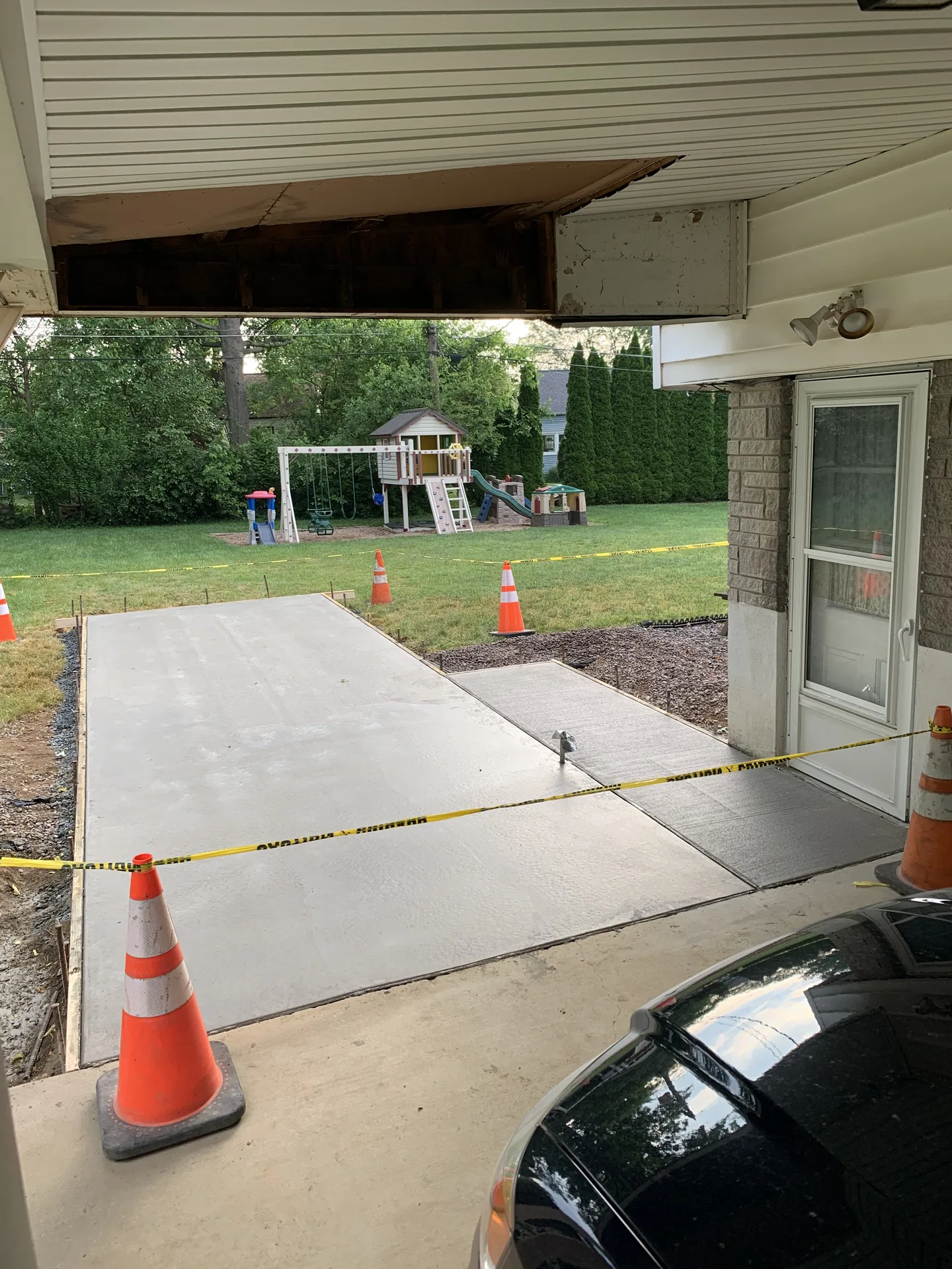 Freshly poured concrete pad and walkway