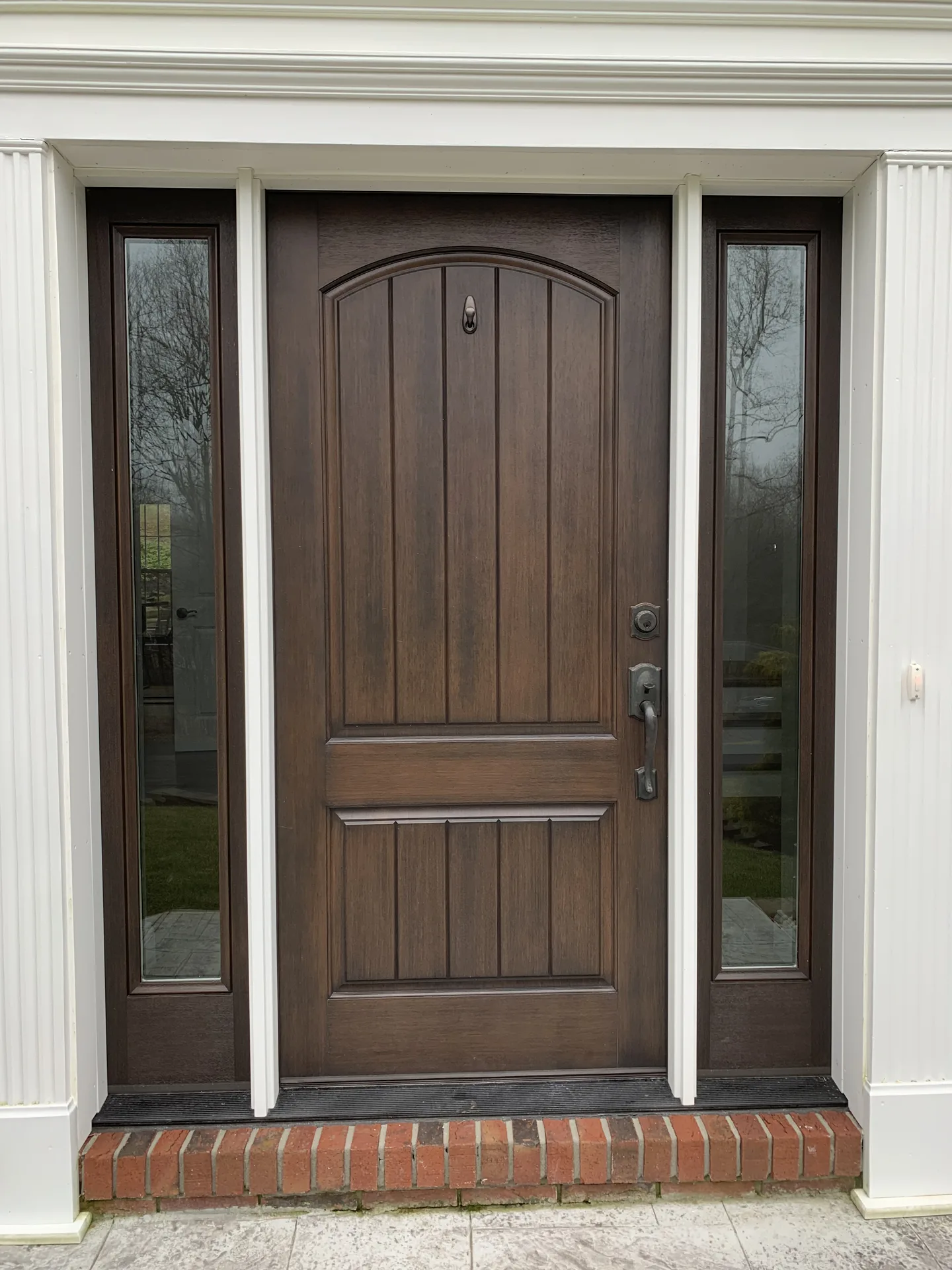 Front entry door with glass sidelites
