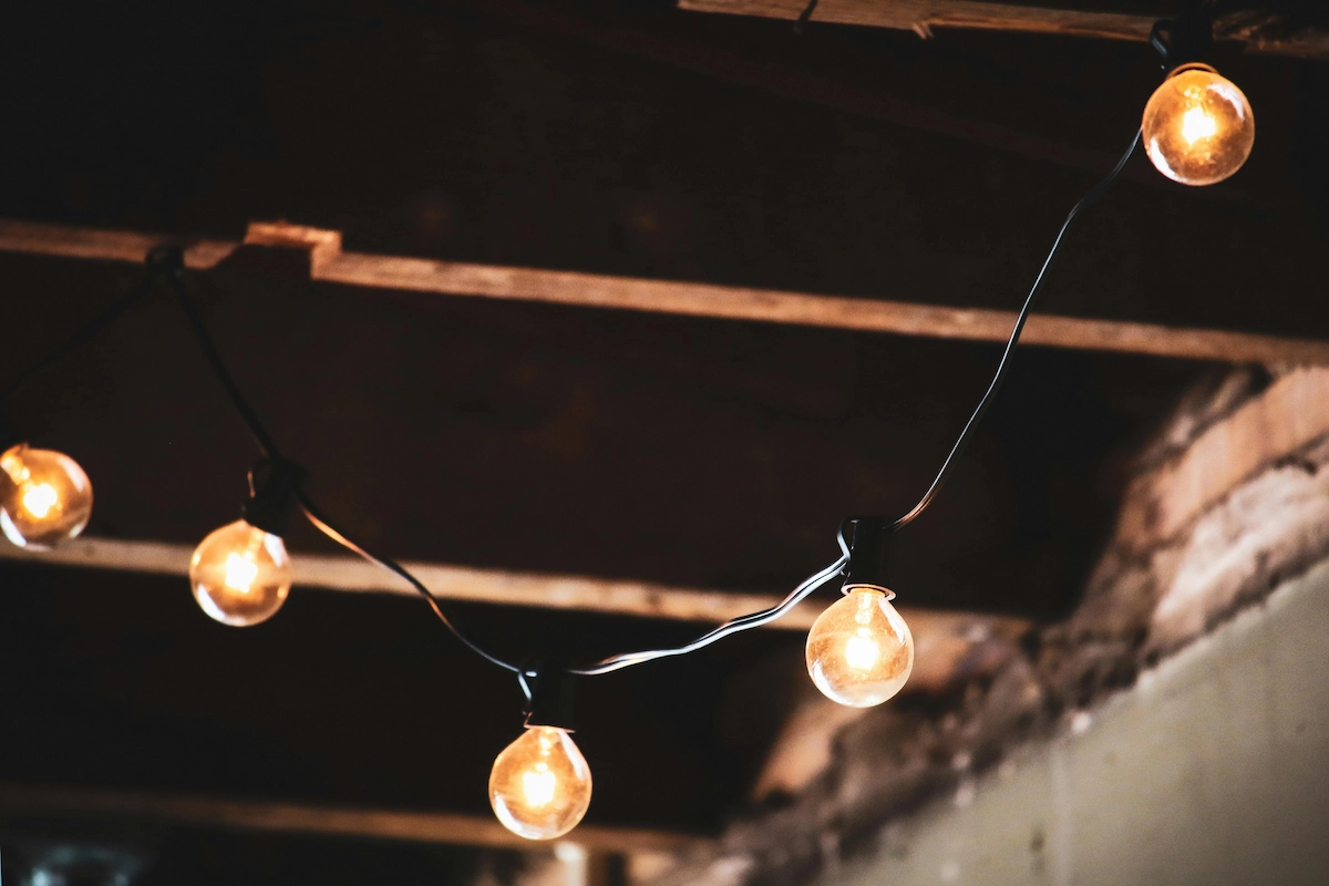 Warm string lights in a finished home