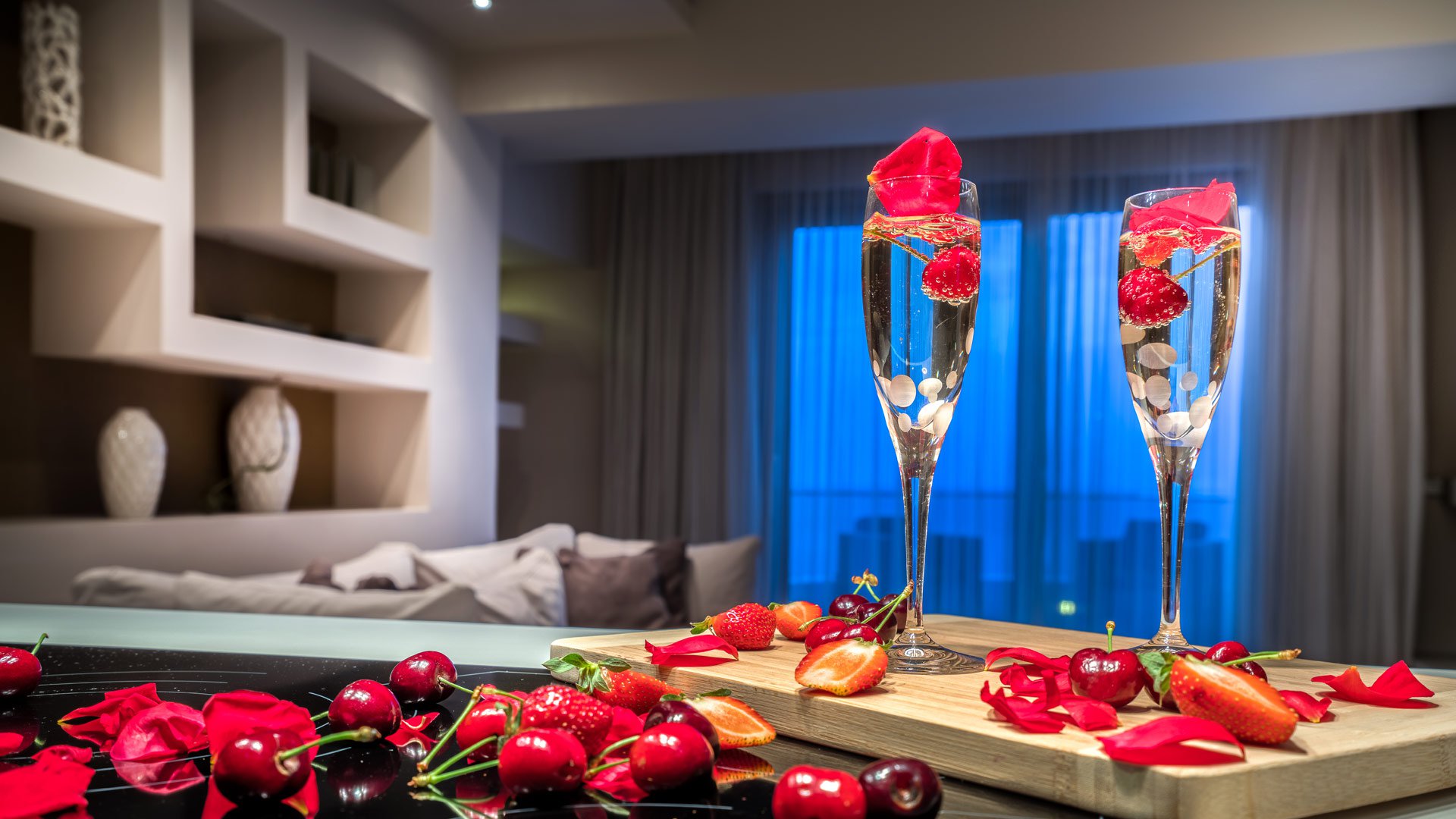 Glasses full of champagne and fruits in the Superior Suite of Kymothoe Elite in Zakynthos