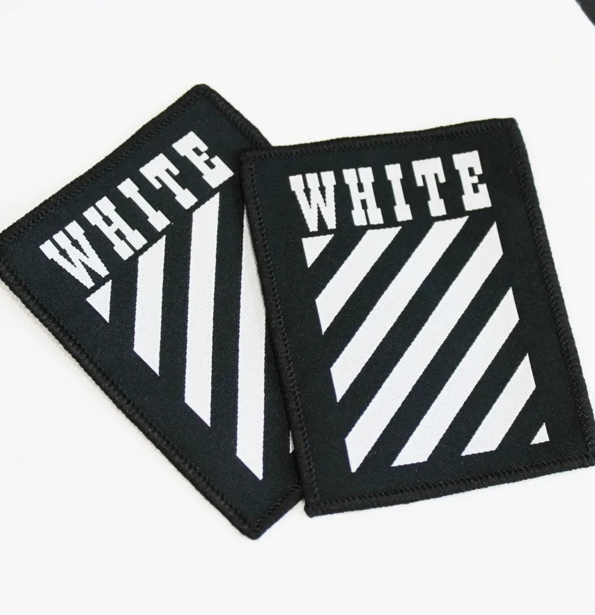 Нашивка жаккардова "WHITE off" зебра 40*55 мм на флізеліновій основі-1