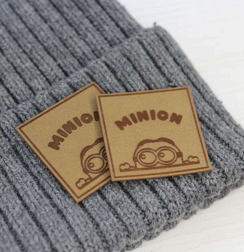 Нашивка "Minion" 35*35 мм песочного цвета-1