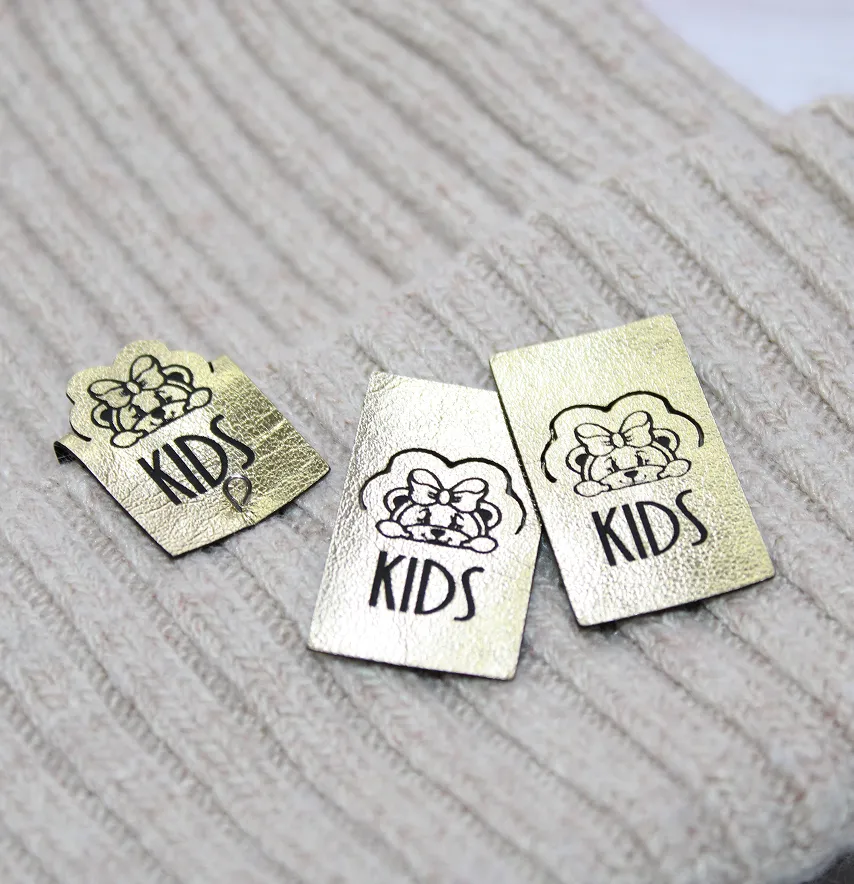 Нашивка "Kids" 20*35 мм золотого кольору-3