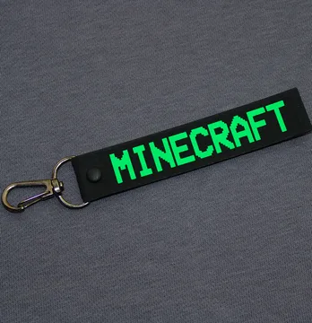 Підвіска з карабіном "Minecraft" 20*120 мм чорного кольору з зеленим написом