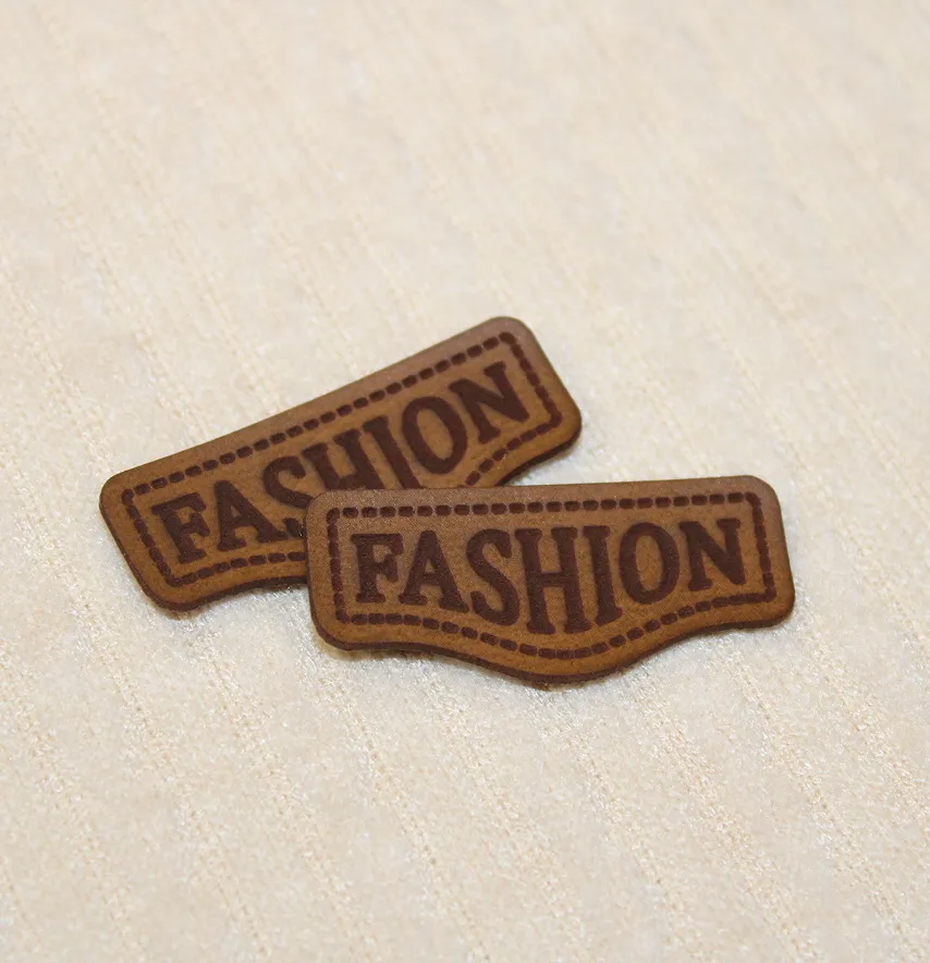 Нашивка "Fashion" 40*18 мм коричневого кольору-1
